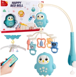 Glasbeni vrtiljak nad posteljico z lučko in ropotuljicami – moder