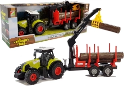 Traktor z gozdarsko prikolico in lesom