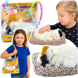 Speča mucka na blazinici z mehkim kožuhom in zvoki mijavkanja v prenosni torbici