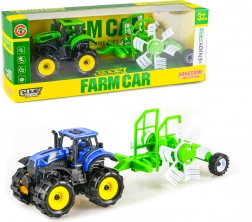 Traktor na vztrajnik s prikolico