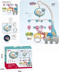 Modri vrtiljak nad posteljico z živalicami