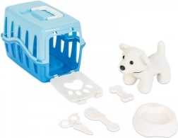 Kužek v modrem transportnem boksu