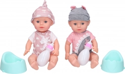 Dojenček z nočno kahlico in stekleničko