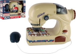 Otroški šivalni stroj s svetlobo na baterije 20 cm