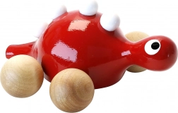 Leseni dinozaver na kolescih rdeč