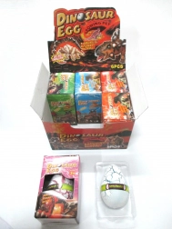 Jajce z rastočim dinozavrom 12×8 cm