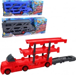 Rdeč tovorni avtomobil s transporterjem in dirkalno stezo