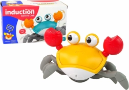 Interaktivni gibljivi rak z melodijami oranžen