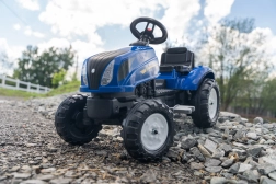 Falk poganjalni traktor New Holland s prikolico in odpirljivim pokrovom motorja od 2 let