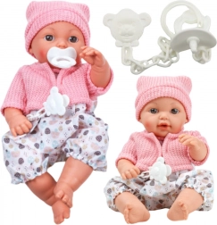 Tekstilna punčka s kapico in zvoki