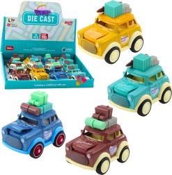 Kovinski retro potovalni avtomobilček s vzmetnim pogonom in poskakujočim pokrovom motorja