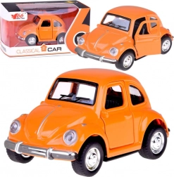 Klasičen oranžen avtomobilček z odpiranimi vrati