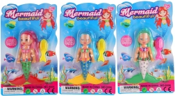 Morska vila z dolgimi lasmi in sijočo obleko