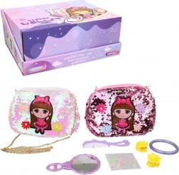 Dekliška torbica z dodatki