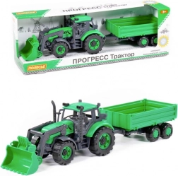 Traktor s prikolico in nakladačem Progress