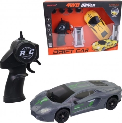 Električni avto na daljinsko upravljanje z zamenljivimi kolesi in funkcijo drsenja