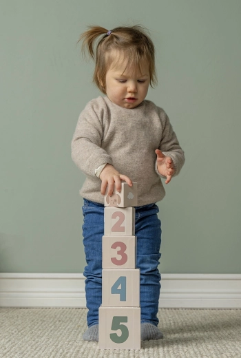 Stacking blocks for balance and first “math”