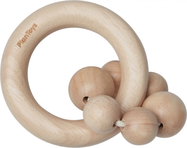 PlanToys ropotuljica z naravnimi kroglicami