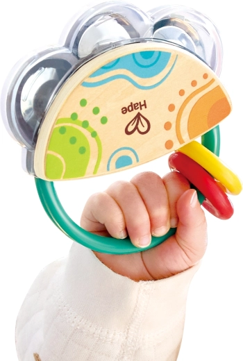 Musical fun and learning with tambourine and rattles