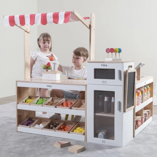 Hladilnik z zamrzovalnikom in tabla za kredo