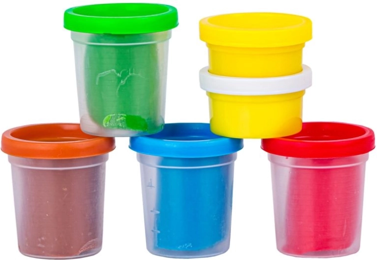Modeling clay in cups and accessories for decorating