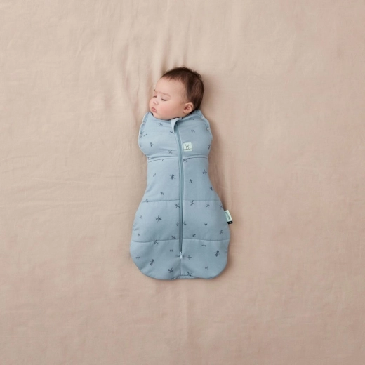 A 2-in-1 swaddle and sleeping bag that grows with your baby