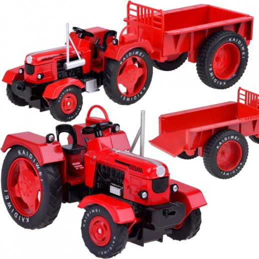 kovinski rdeč traktor s prikolico 1:18 z gumijastimi kolesi