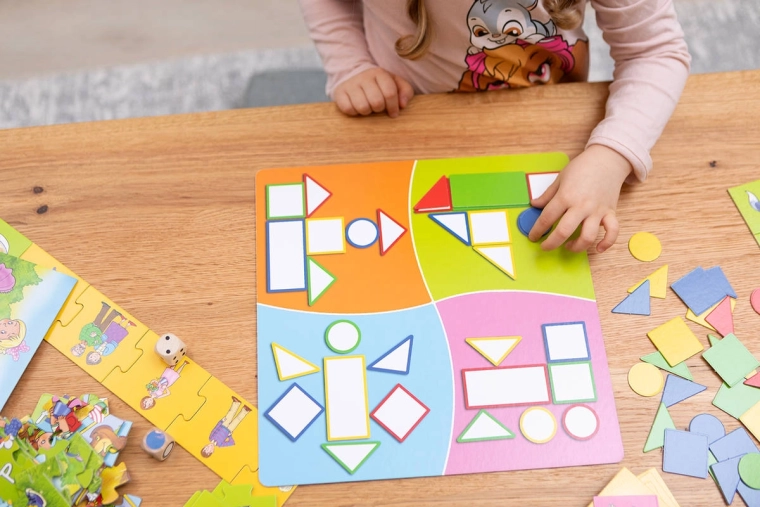 Learning colors, shapes and logic through play