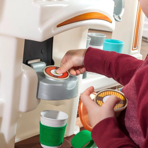 Kavni aparat s kapsulami kot pri odraslih