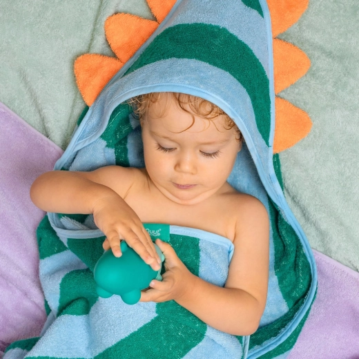 Vesel dizajn dinozavra, ki je otrokom všeč
