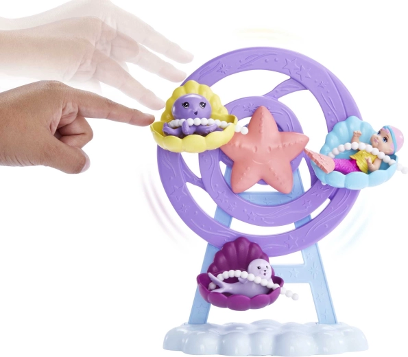 Vrteči se vrtiljak z školjčkastimi sedišči