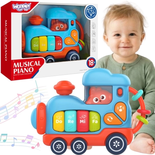 Woopie baby interaktivni glasbeni klavirček lokomotiva