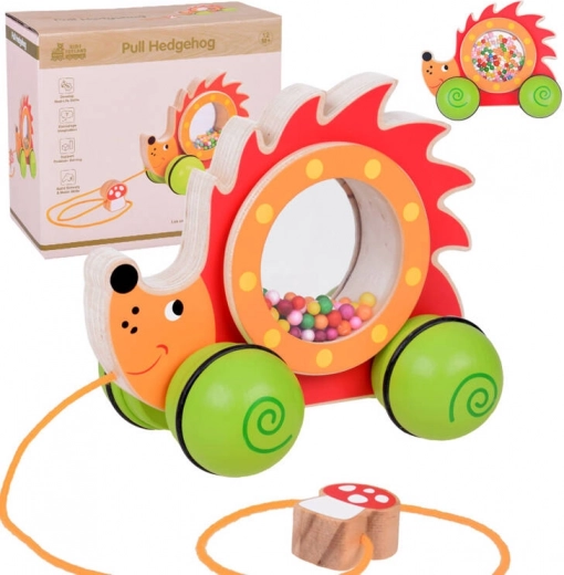 Leseni vlečni ježek z barvnimi kroglicami