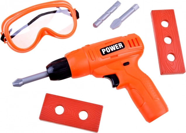 Battery-powered drill and accessories for even more fun