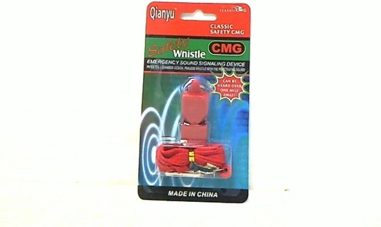 Referee whistle in blister pack