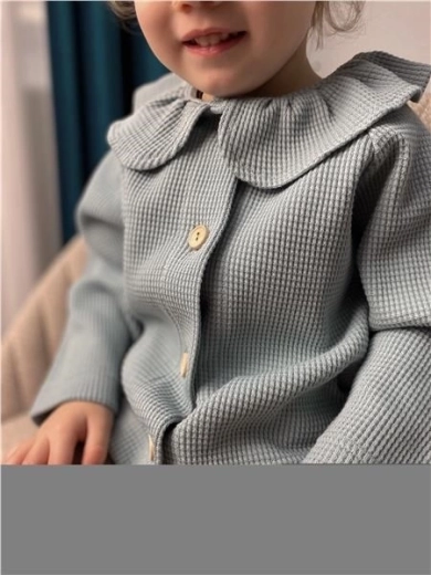 Praktično zapenjanje z gumbi