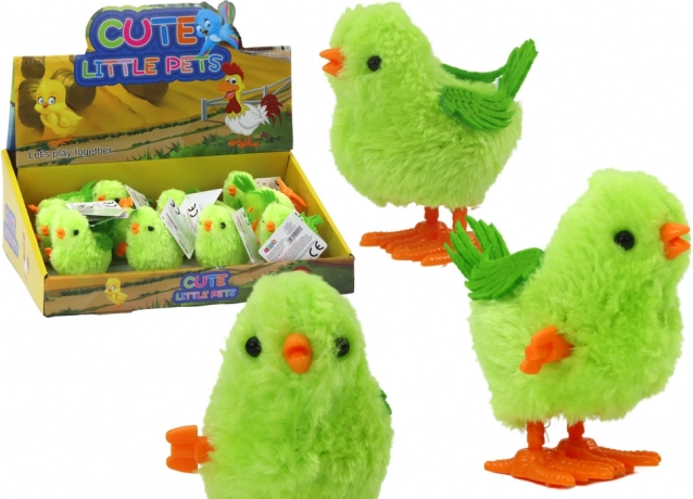 Skakajoča navijalna igrača piščanec zelene barve