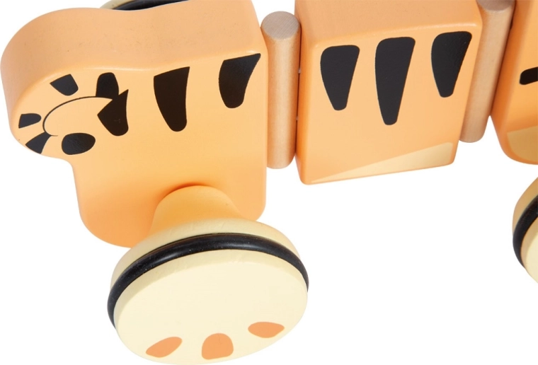 Prožno tridelno telo z valovitim učinkom