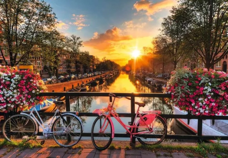 Ravensburger puzzle Sončni zahod v Amsterdamu XL 200 kosov