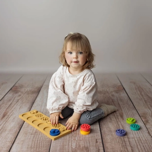 Enostaven oprijem in razvoj fine motorike