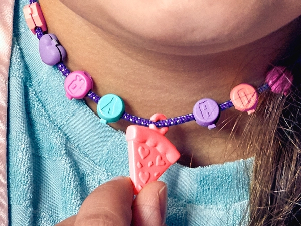 Stiliranje, kroglice in pizza obesek