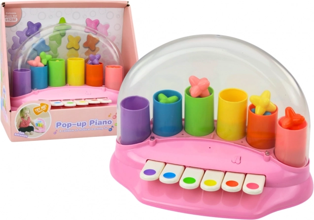 Interaktivni rožnati klavirček z izstreljujočimi zvezdicami