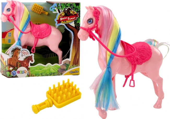 Figurica konja z barvito grivo in rožnatim sedlom