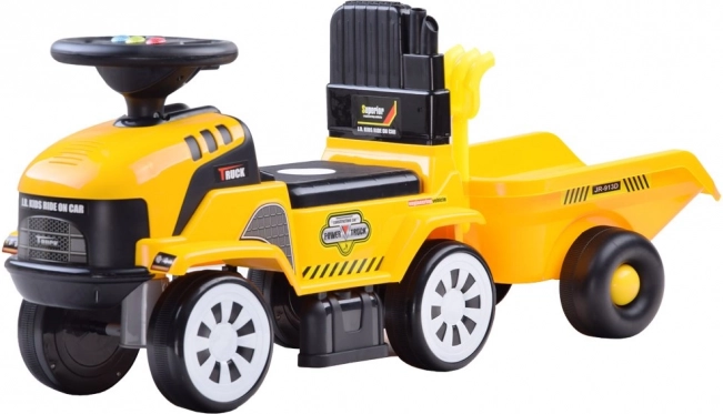 Poganjalec traktor s prikolico in melodijami za otroke – Traktor