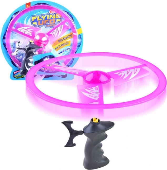 Leteči disk z izstreljevalnikom in svetlobnim učinkom – Rožnata