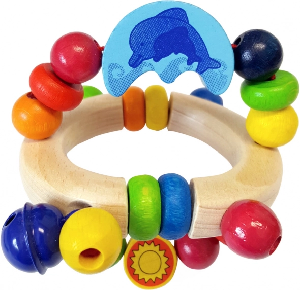 Lesena ropotulja z delfinom