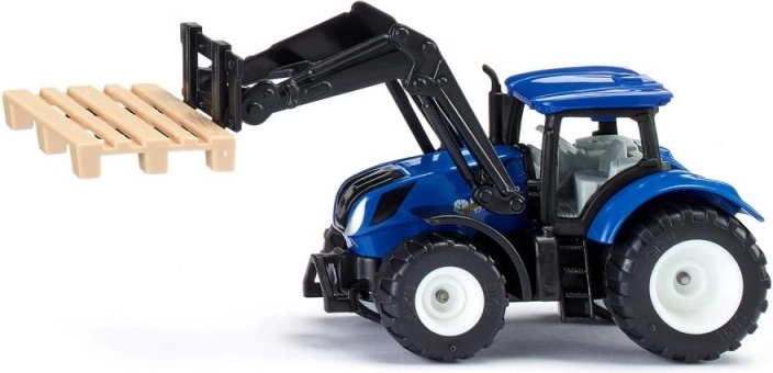 Traktor New Holland z vilicami in paletami