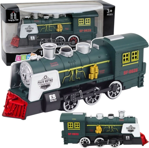 Klasična zelena parna lokomotiva z dimom, lučmi, zvoki in tipalom za ovire