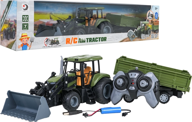 Zeleni RC traktor s čelnim nakladalnikom in prikolico v merilu 1:20