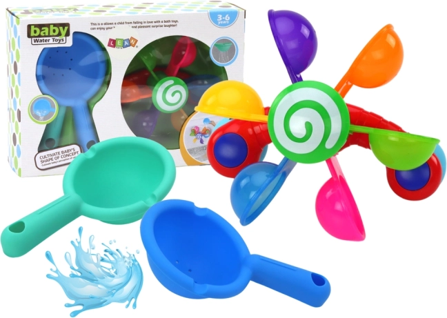 Vrteča igrača za kopel z barvnimi skledami in dvema žlicama